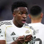 vini-jr.-marca-e-danca,-real-vence-benfica-e-vai-as-oitavas-da-champions